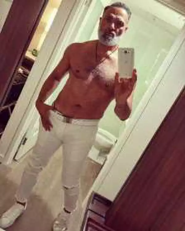 Seems the sexy grandpa that broke the internet months ago is/was g*y (photos)